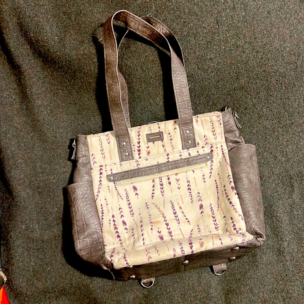 Diaper bag with many pockets.